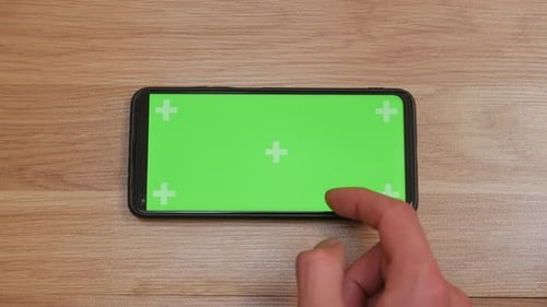 Hand Uses Smartphone Green Screen