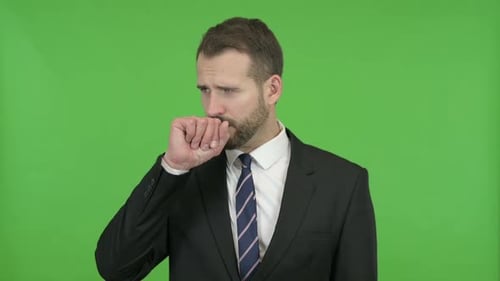 Sick Young Businessman Having Coughing Against Chroma Key