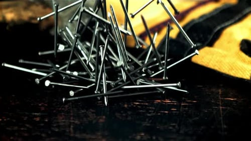 A Bunch of Nails Fall on the Table