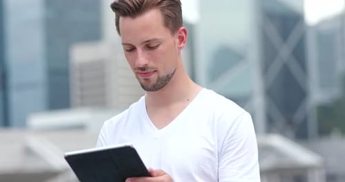 Caucasian Young Man Use of Tablet Computer