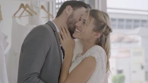 Loving Couple Sharing a Romantic Wedding Day Kiss