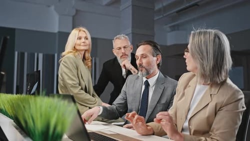 Business Team Meeting in Modern Office Environment