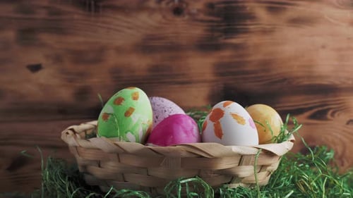 Colorful Easter Eggs in Woven Basket