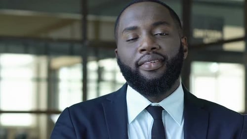 Self-Confident Black Businessman Looking on Camera, High Post, Successful Career