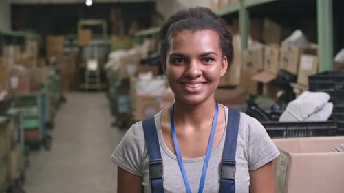 Laughing Latin-American Factory Worker