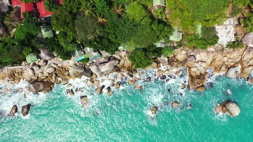 Aerial above seascape of beautiful island beach break by blue ocean with white sandy background of a