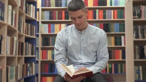 The student spends a lot of time in the reading room of the university library.