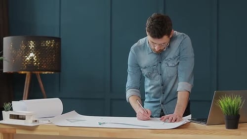 Architect Working on Blueprint with Spesial Tools and Pencil, Close Up, Male Architect at Work, Only