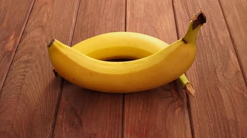 Two Bananas on a Wooden Surface