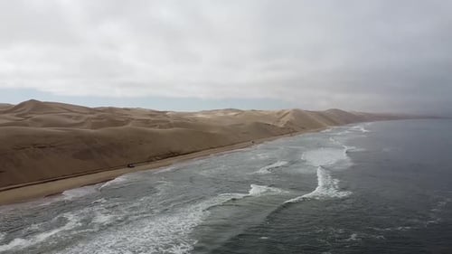 Gorgeous view on the shore of the ocean with big sand dunes, Namibia
