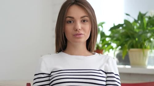 Woman Reacts with Surprise