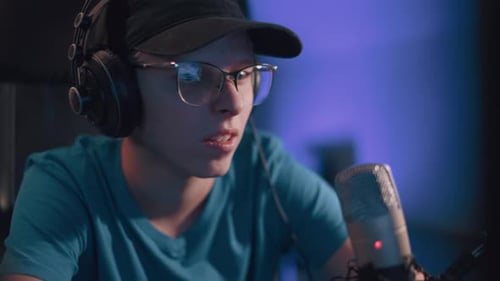 Close Up of Person Speaking into Microphone