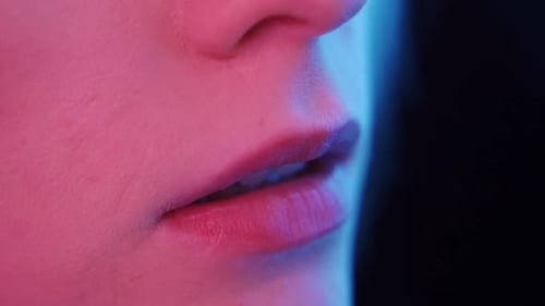 Close Up of Face in Blue and Pink Light