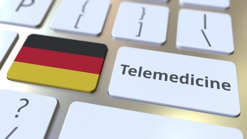 Pressing Telemedicine Key with German Flag on Computer Keyboard