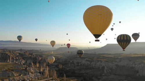 Hot Air Balloons Soar Over Cappadocia at Sunrise