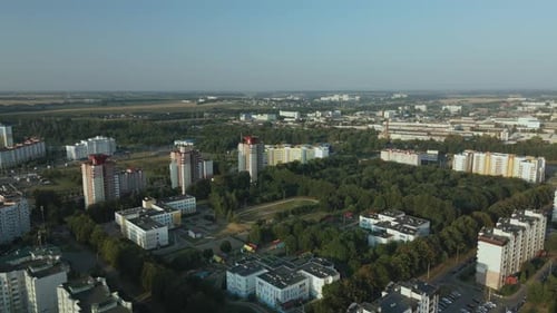 City Block. Modern Multi Storey Buildings. Flying At Dusk At Sunset. Aerial Photography