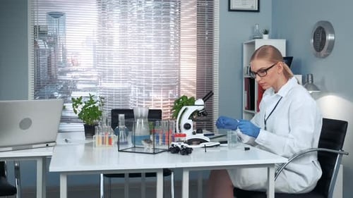 Female Scientist Working in a Laboratory