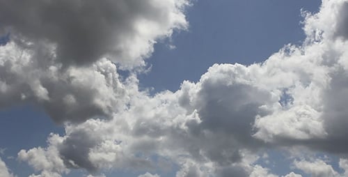 Billowing White Clouds Time Lapse in Blue Sky