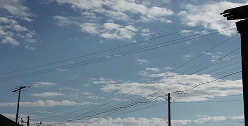 Blue Sky and Power Lines in an Urban Setting