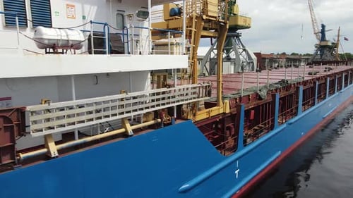 Aerial View of Cargo Ship Docked in Port