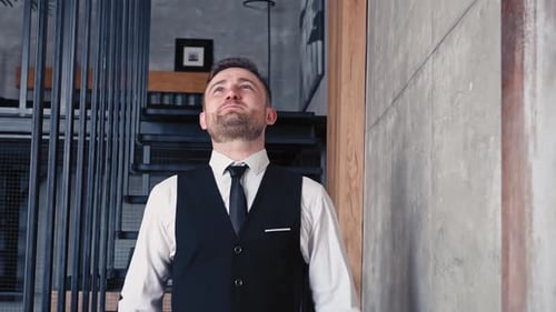 Man Gives Military Salute Indoors