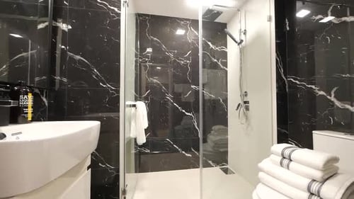 Elegant Bathroom with Marble Pattern Wall Decoration