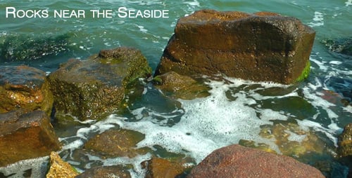 Waves Crashing on Rocks at the Sea Shore