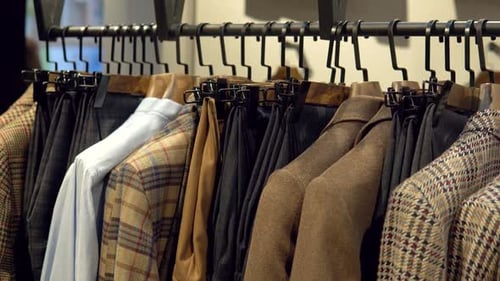 Showcase with Jackets From the New Collection in the Luxury Boutique of Men's Suits