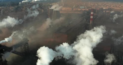 Aerial View. Emission To Atmosphere From Industrial Pipes.