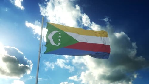 Realistic Comoros National Flag Waving with Sunny Sky Background
