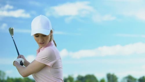 Unexperienced Young Woman Making Hits on Golf Course, Practicing in Golf, Hobby