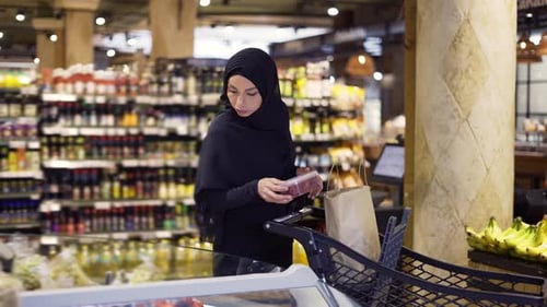 Woman Shopping for Groceries in Urban Market
