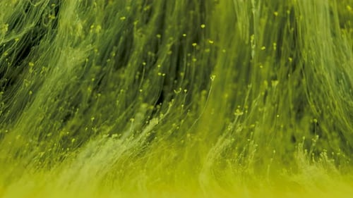 Abstract Yellow Liquid Flowing and Mixing