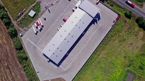 Distribution Warehouse with Truck Parking Aerial View