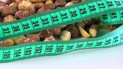 Roasted Peanut With Tape Measurement Turning 8