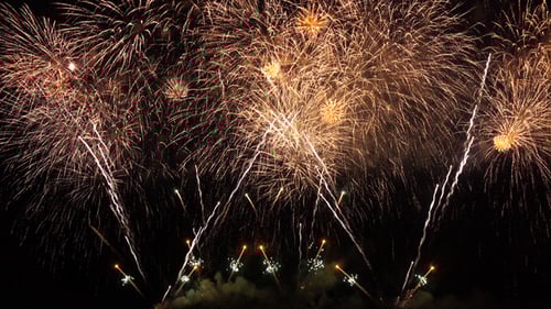 Golden Fireworks Exploding in the Night Sky