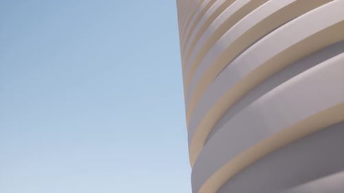 Rundes Gebäude aus Beton, futuristisches Gebäude mit moderner Architektur, klarer blauer Himmel