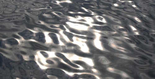 Sunlight Dancing on Rippling Water Surface