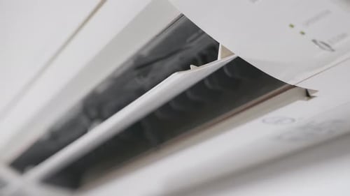 Air Conditioner Vent Opens in Close Up Shot