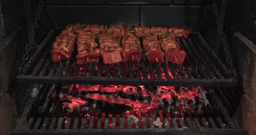 Closeup Shot of Barbecuing Chicken Meat on Griller, Grillng Roasting on Barbecue Griller
