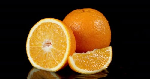 The Orange Slice Falls Into the Water.