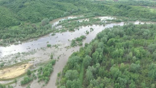 Aerial View of Flooded River in Rural Landscape