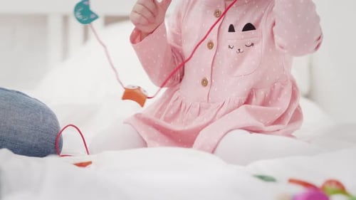 Child Playing With a Toy at Home