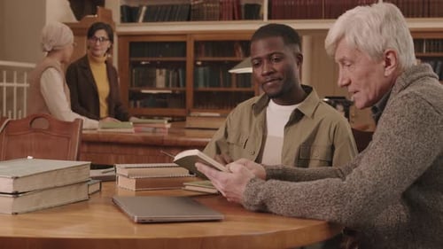 University Students Studying in Library