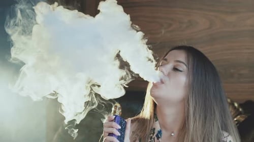 exhaling cigarette smoke through nose Woman Vaping and Exhaling a Cloud, People Stock Footage ft. woman & indoors exhaling cigarette smoke through nose Woman Vaping and Exhaling a Cloud, People Stock Footage ft. woman & indoors