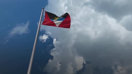 Antigua and Barbuda Flag Waving Realistic Sky Background