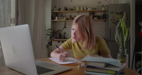 Girl Studying and Doing Homework at Home