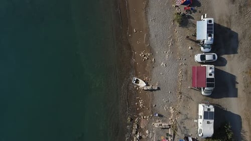 Scenic Beachside Camping with Recreational Vehicles Aerial View