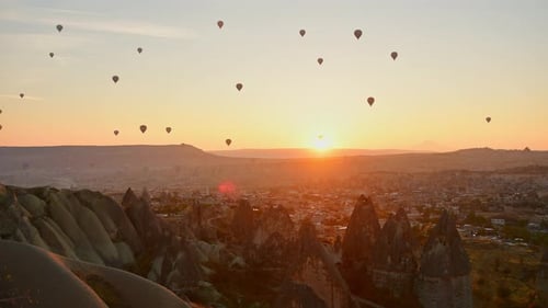 Hot Air Balloons over Cappadocia Valley at Sunrise