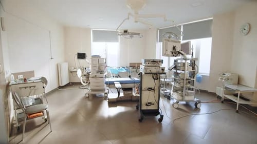 Well-Lit Empty Operating Room with Modern Medical Equipment
